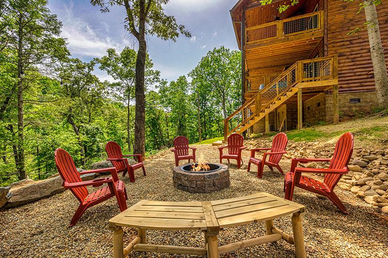 Seating for 9 around your cabin rental's fire pit. at Big Splash Lodge in Gatlinburg TN