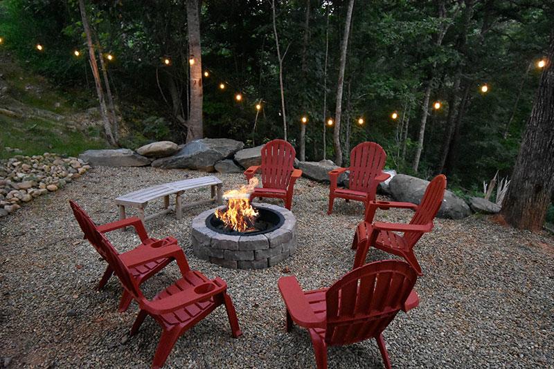 Fire pit at your Smokies cabin rental. at Big Splash Lodge in Gatlinburg TN