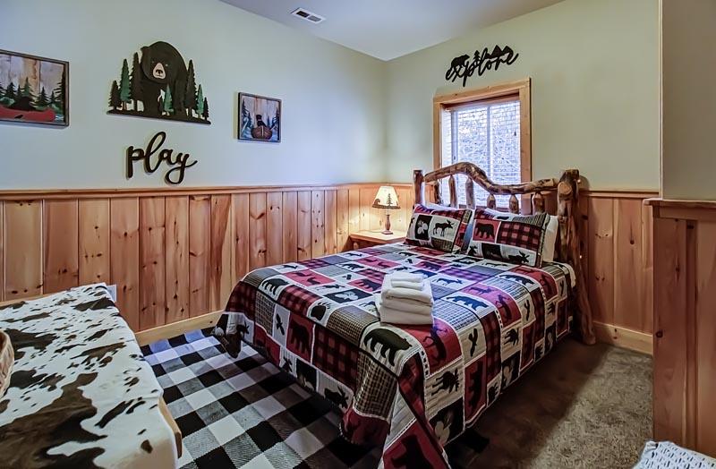 Bedroom 1's relaxing log bed. at A Great Escape in Gatlinburg TN