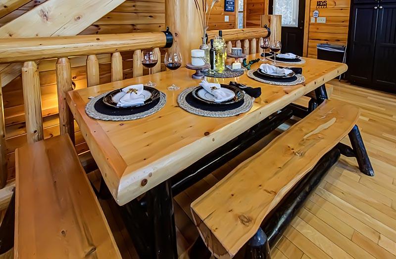 Large family dinner table in your rental cabin in the Smokies. at A Great Escape in Gatlinburg TN