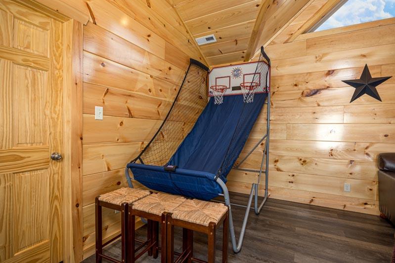 Game room with basketball toss. at Big Splash Lodge in Gatlinburg TN