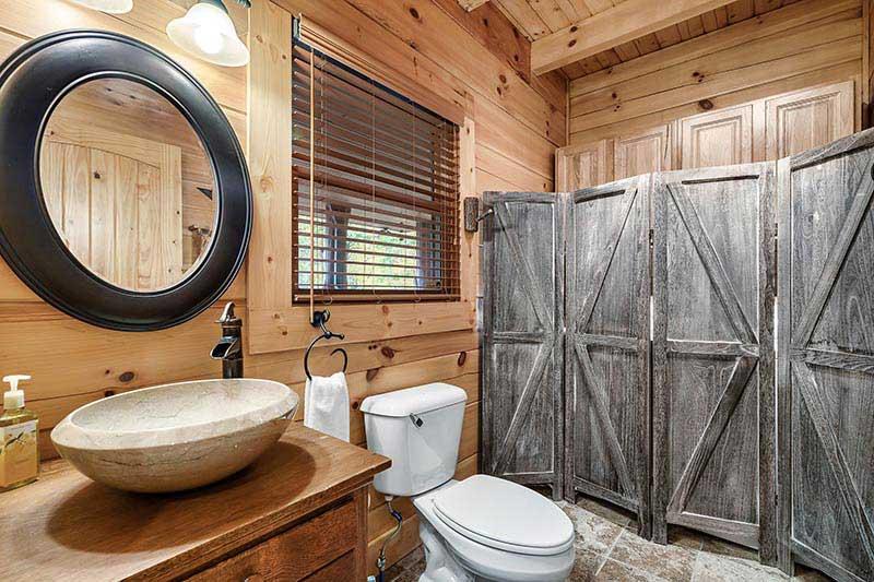 Country style second bath at your cabin in the Tennessee Smoky Mountains. at Alpine Oasis in Gatlinburg TN