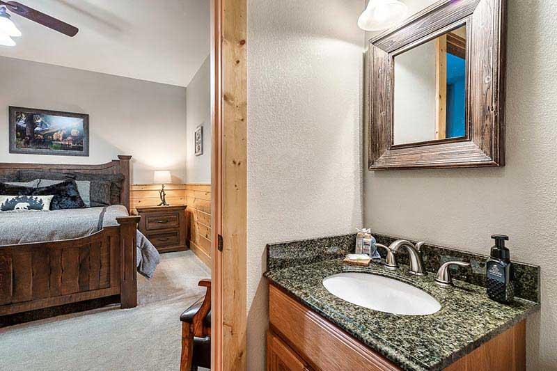 Cabin's bedroom bath suite. at Alpine Oasis in Gatlinburg TN