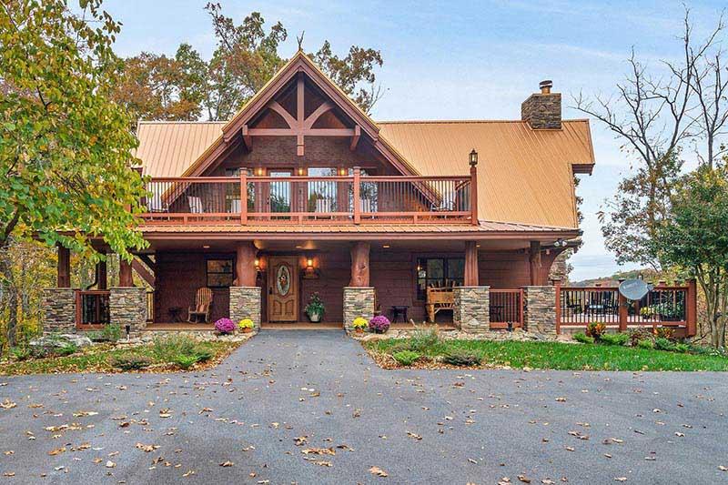 Exterior of your big cabin in the Smoky Mountains, a spacious 6 bedroom. at Alpine Oasis in Gatlinburg TN