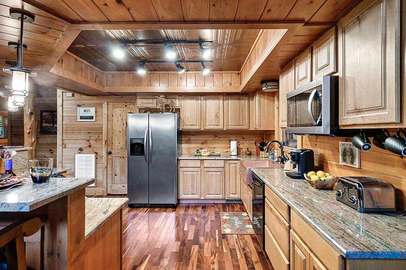 Fully equipped kitchen at your cabin in the Smokies. at Alpine Oasis in Gatlinburg TN