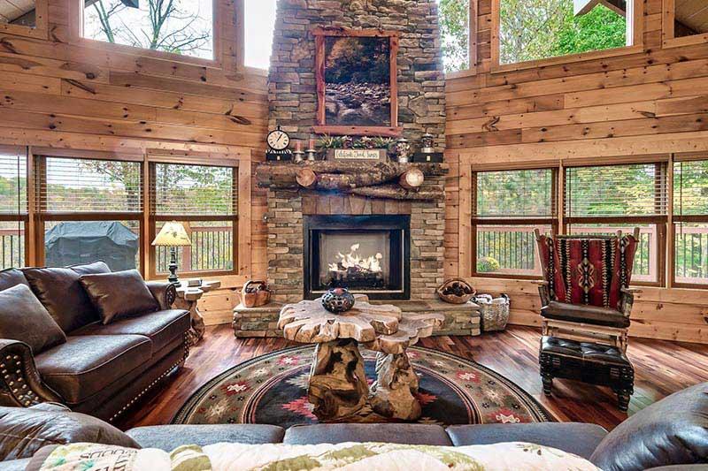 Feel the warmth and ambience of your cabin's fireplace. at Alpine Oasis in Gatlinburg TN