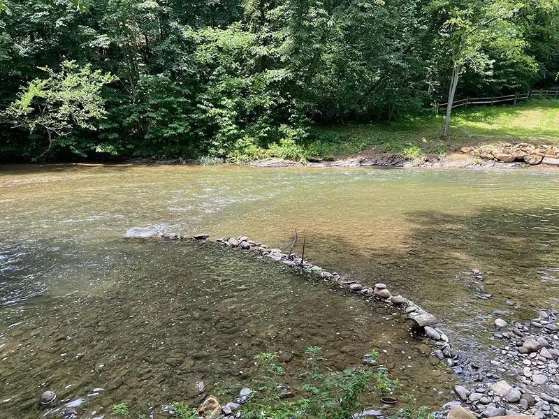 Wade your feet in Pigeon Forge's Little Pigeon River. at River Waltz in Gatlinburg TN