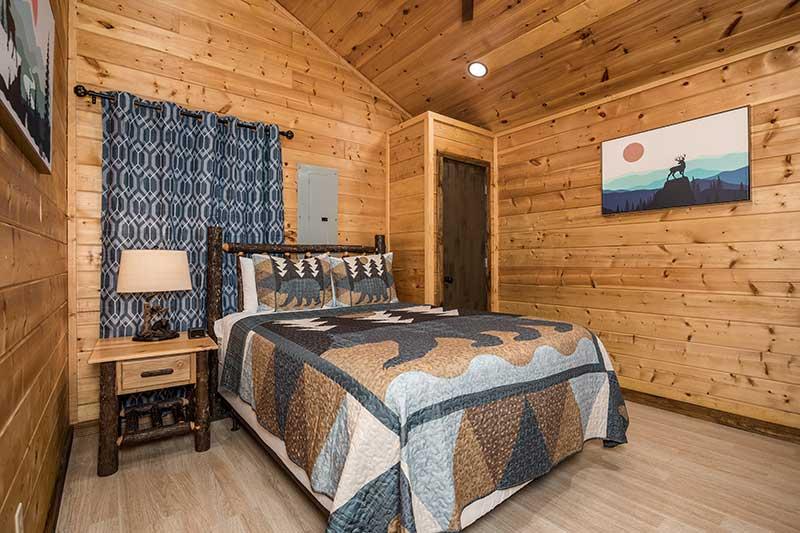 Your cabin's 1st bedroom. at Moonlight Obsession in Gatlinburg TN