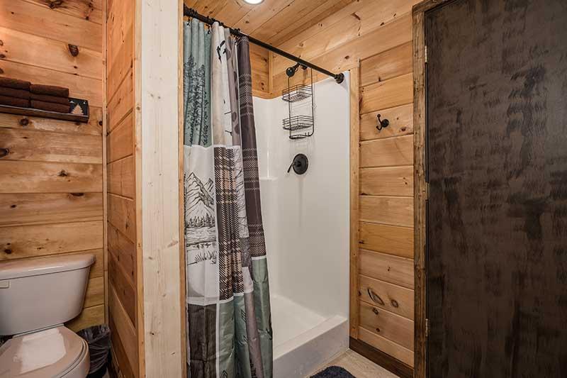 Shower in your cabin's 1st bedroom. at Moonlight Obsession in Gatlinburg TN