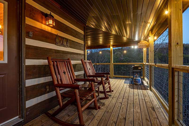 Watch from your cabin's front porch rockers as dusk settles over the Smokies. at Moonlight Obsession in Gatlinburg TN