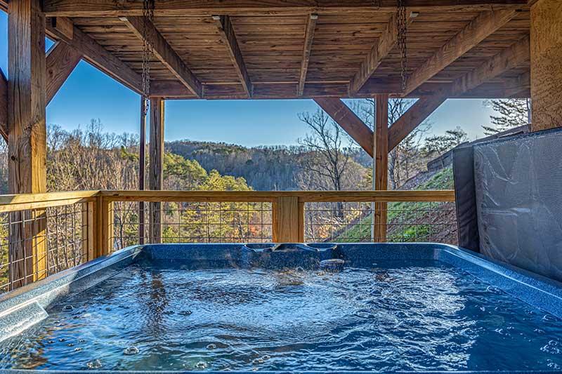 Cabin hot tub in the Tennessee Smoky Mountains. at Moonlight Obsession in Gatlinburg TN