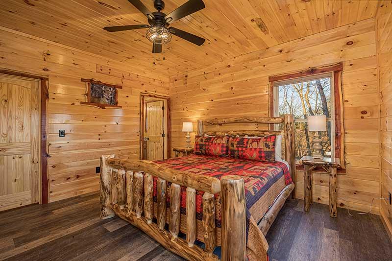 2nd bedroom with a relaxing king sized log bed. at Morning View in Gatlinburg TN