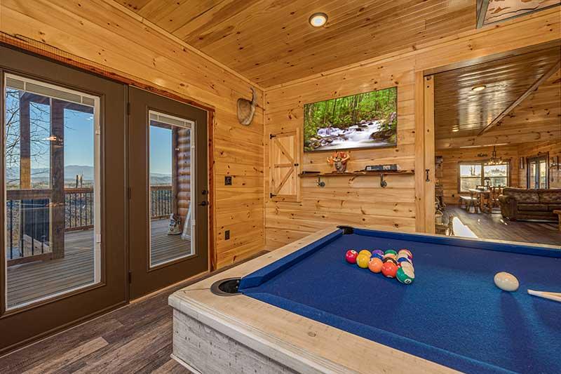 Find hours of fun playing pool at you cabin rental in the Tennessee Smokies. at Morning View in Gatlinburg TN