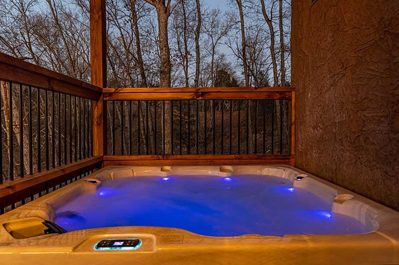 Take a warm dip in your romantically lighted Smoky Mountains hot tub.  at Morning View in Gatlinburg TN