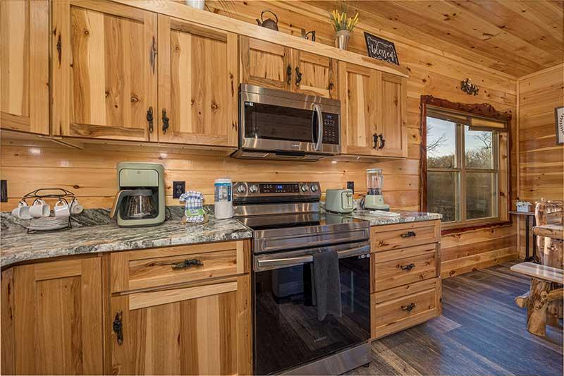 Your cabin's kitchen has all the amenities of home. at Morning View in Gatlinburg TN