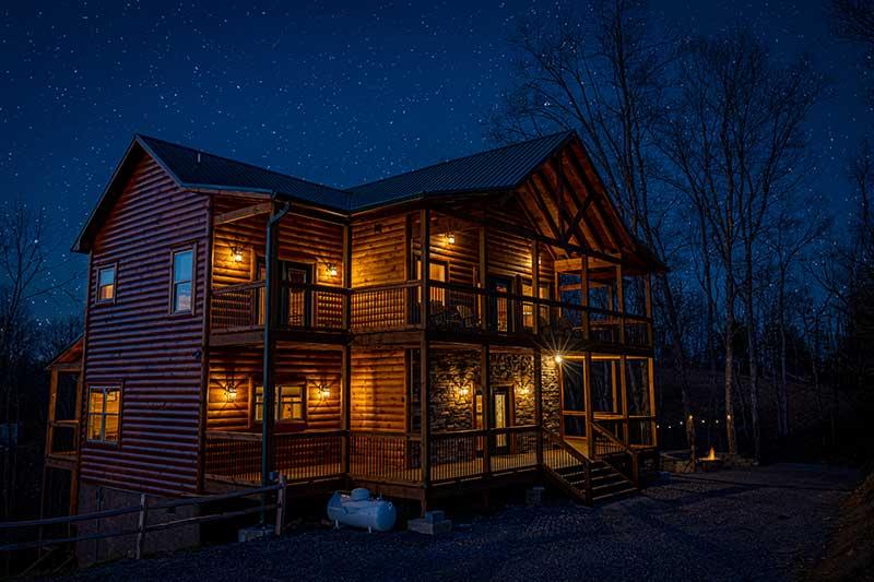 Smoky Mountains cabin at night.  at Morning View in Gatlinburg TN