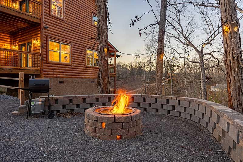 Enjoy gathering around your cabin's outdoor fire pit. at Morning View in Gatlinburg TN