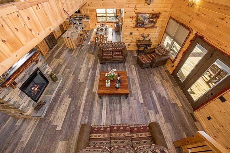 View of the living room from the cabin stairs. at Sunset Peak in Gatlinburg TN