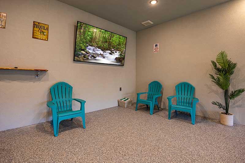 Seating around the cabin's swimming pool. at Sunset Peak in Gatlinburg TN