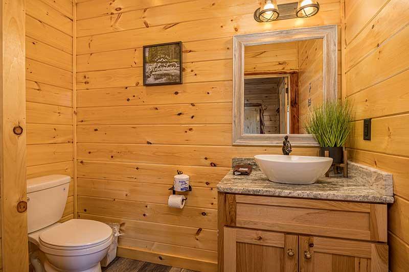 The cabin's half-bath on the main floor. at Sunset Peak in Gatlinburg TN