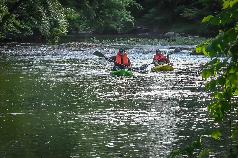 Enjoying a relaxing kayak trip on the Little Pigeon river. at River Waltz in Gatlinburg TN