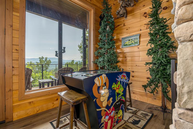 Your cabin in the Smokies brings the beauty indoors through all the large windows. at Five Bears Mountain View Lodge in Gatlinburg TN