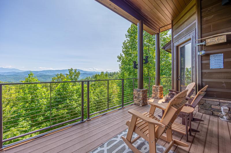 Porch seating throughout this big vacation home, at Five Bears Mountain View Lodge in Gatlinburg TN