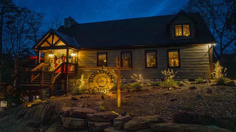 Night shot of Sevierville cabin rental. at Stonehenge Cabin in Gatlinburg TN