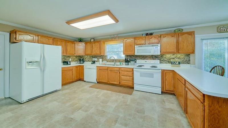 Fully equipped kitchen at your Smokies vacation home. at Bear Splashin Fun in Gatlinburg TN