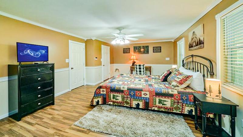 Bedroom One with television. at Bear Splashin Fun in Gatlinburg TN