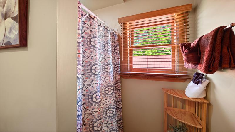 Shower tub combination in your cabin's third full bath. at Moonlight Pines Lodge in Gatlinburg TN