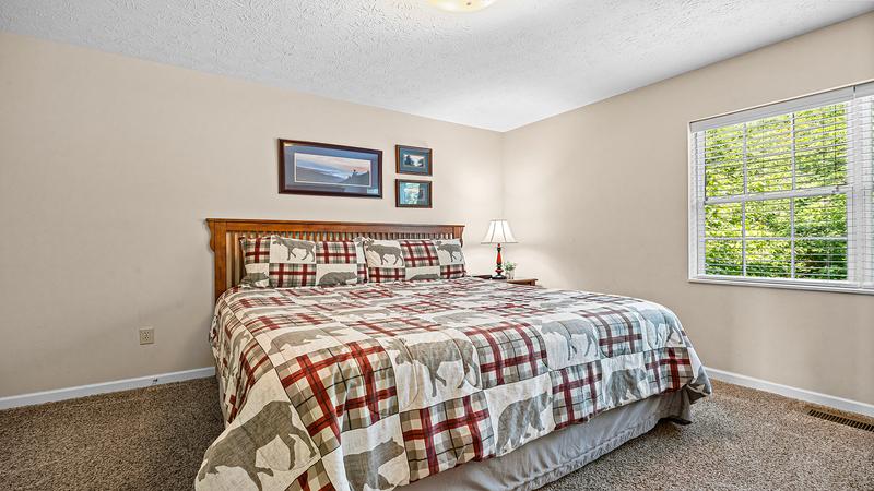 Cabin's 1st bedroom with plenty of space. at Bear Crossing in Gatlinburg TN