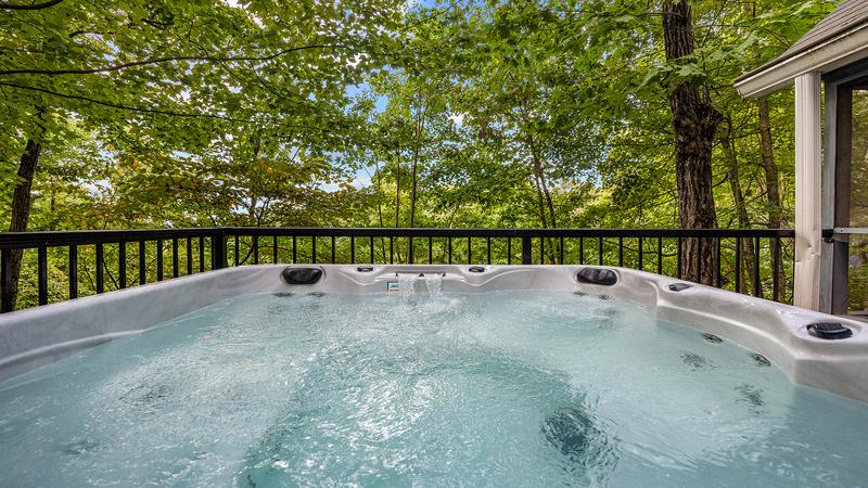 Hot tub located at your Gatlinburg chalet in Chalet Village with access to three resort pools. at Chalet All Day in Gatlinburg TN