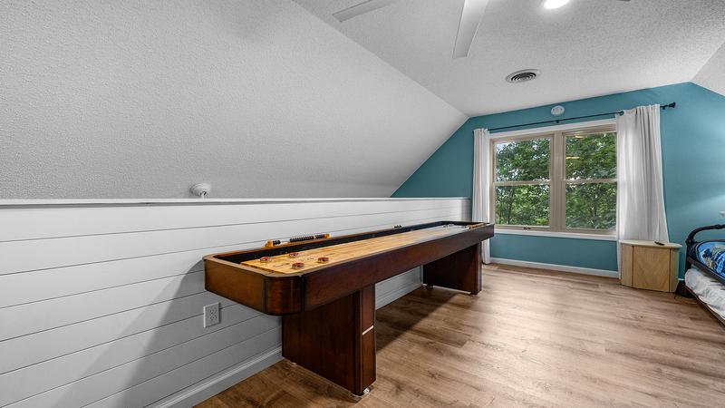 Play endless challenging games of shuffleboard with family and friends. at Chalet All Day in Gatlinburg TN