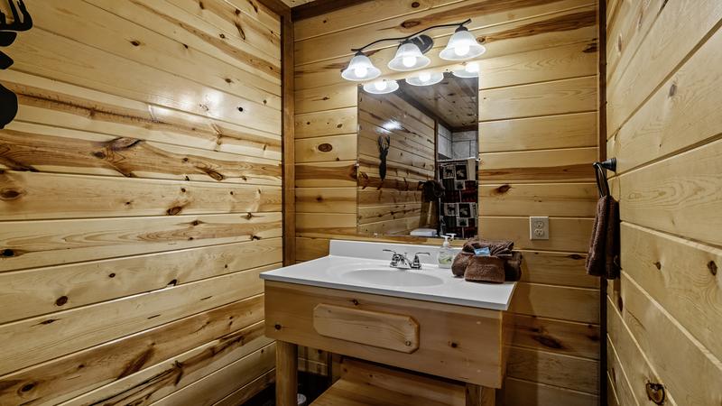 Enjoy a log cabin filled with 8 baths.