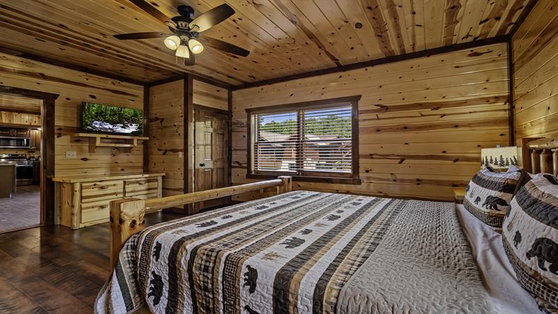 First bedroom's television and extra seating area.