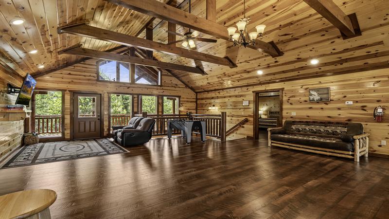 Your cabin's game room offers relaxing seating doubling as more sleeping space when needed. 