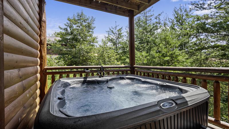 Enjoy memorable moments in this Smoky Mountains family sized hot tub.