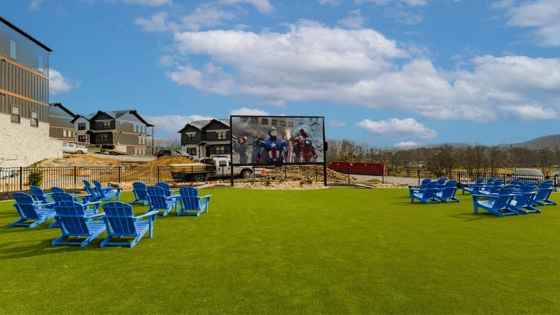 A beautiful large outdoor movie screen with plenty of seating at Smith Creek Waterpark.