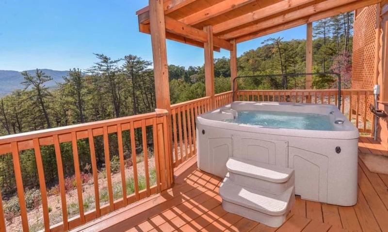 Family Sized Hot Tub With Smoky Mountain Views Take in the scenic Smoky Mountains from your rental cabin's large hot tub.