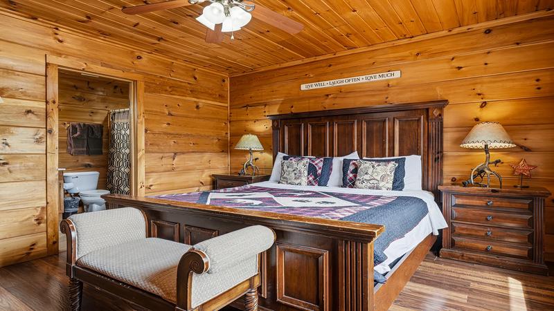 King Bed Seating Large bedroom with seating, tv and full bath.