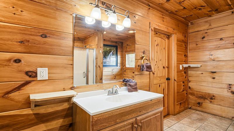 Plenty Of Sink Lighting The well lit bath makes readying for outings easy.