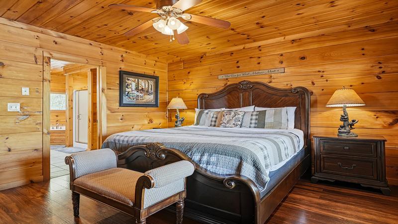 Rental Cabin Master Bedroom King Bed King Bed and seating at your rental cabin's master bedroom.