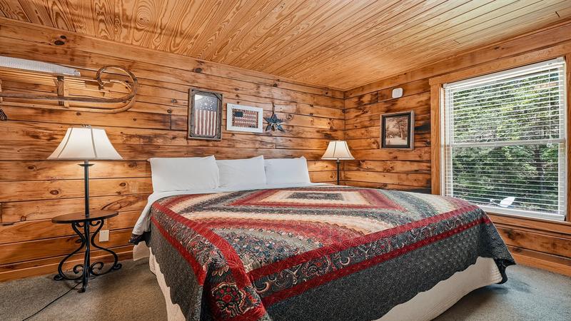 Echota Resort Cabin First Bedroom First bedroom in your Echota Resort cabin rental.