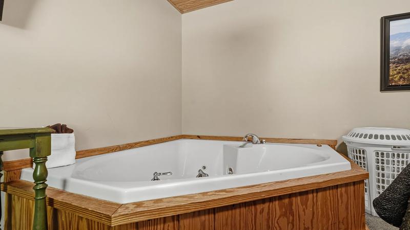Cabin Jacuzzi Tub Jacuzzi tub in your Smoky Mountains cabin rental.