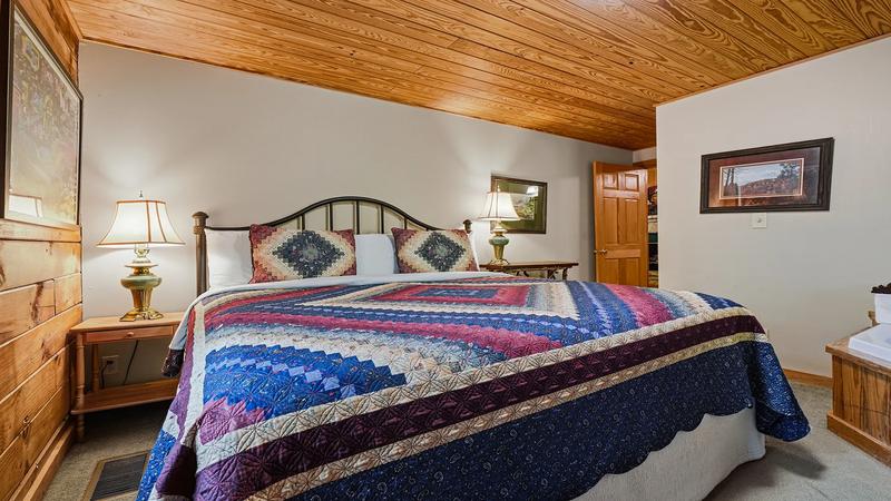 Cabin Rental King Bed Comforting king size bed at your cabin in the Smokies.