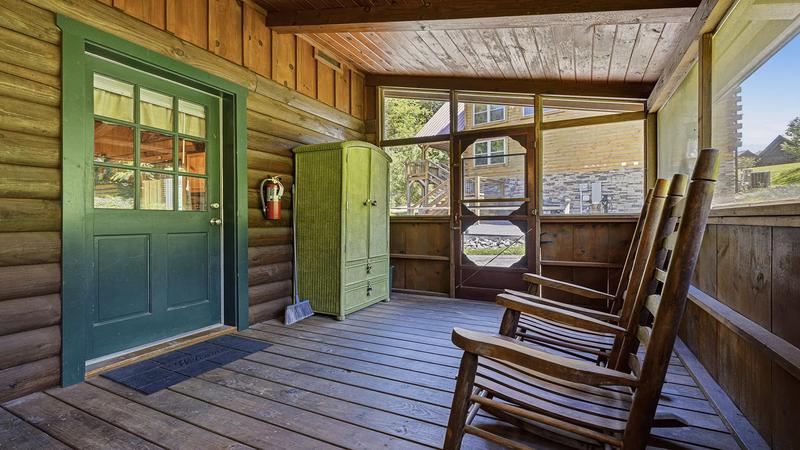 Feel The Cabin Breeze Back enclosed cabin porch, relax and feel the breeze.