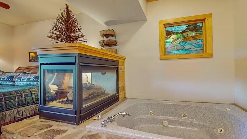 King Suite With Fireplace King Suite #2 with its own fireplace beside the jacuzzi tub.