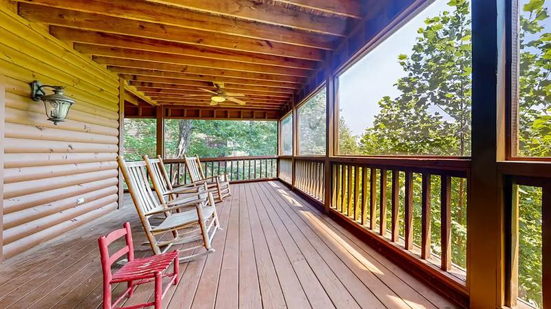 Spacious Rental Cabin Porch Spacious cabin porch with plenty of rockers for family and friends.