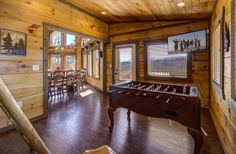 Television and foosball table just off from the dining room. at A Point of View in Gatlinburg TN